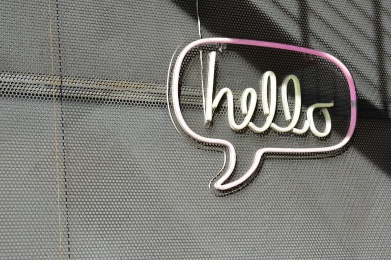 Hello in neon hanging on a wall
